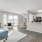 apartment living room with windows and renovations
